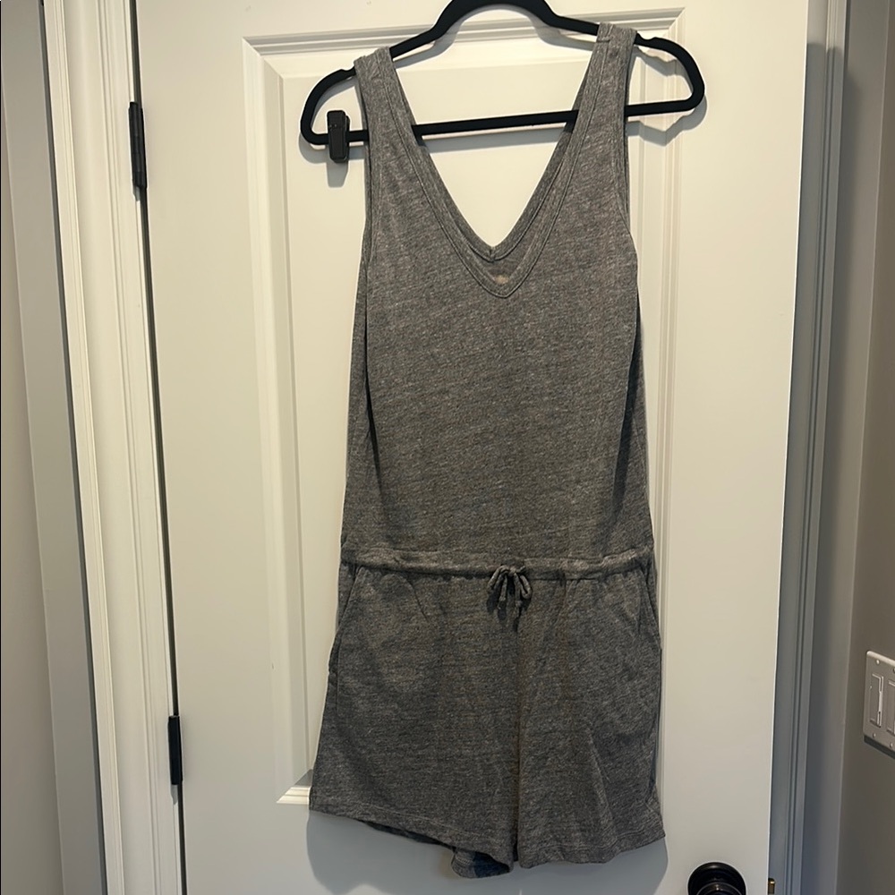 Chaser Gray Sleeveless Romper with tie waist and front and back pockets